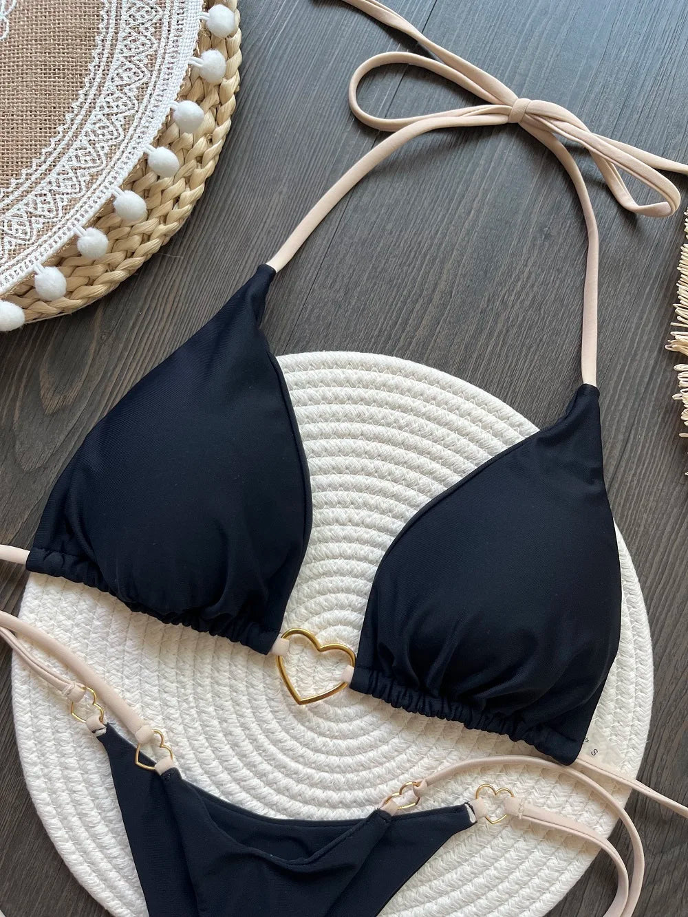 Solid color halter bikini set for women, two-piece swimsuit with triangle top and thong bottoms, by The Clothing Company Sydney.