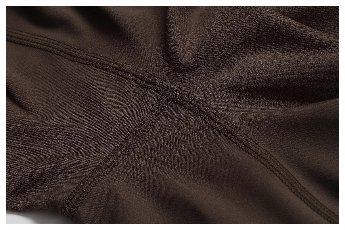 Open back V jumpsuit gym set for women by The Clothing Company Sydney, featuring stretch fitness bodysuit, ideal for yoga and workouts.