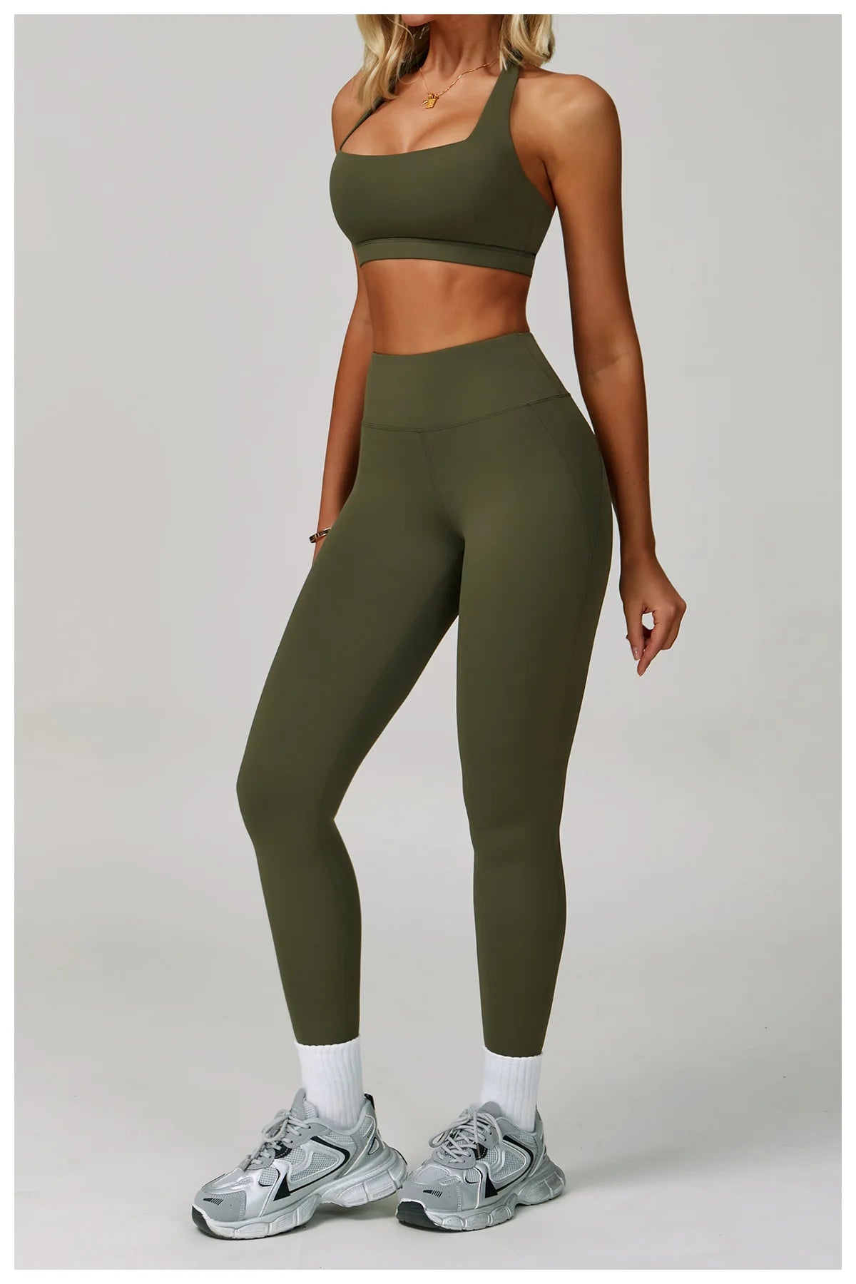 Women's fitness tracksuit set with high-waist leggings and sports bra from The Clothing Company Sydney, ideal for yoga and workouts.