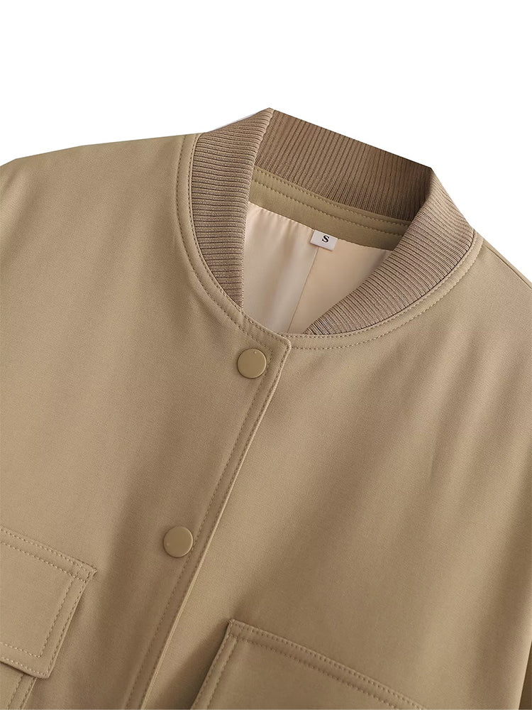 Women's bomber jacket by The Clothing Company Sydney, featuring a stylish fit and trendy design in a close-up view.