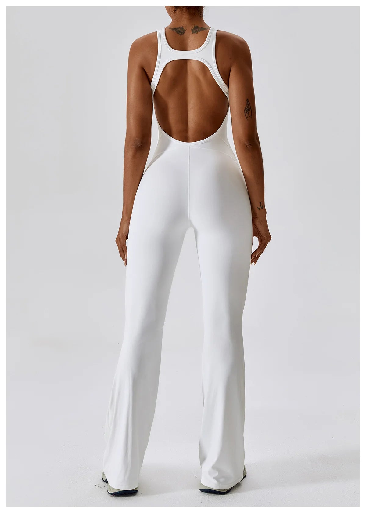Open back v-neck fitness jumpsuit by The Clothing Company Sydney, featuring stretch fabric, suitable for gym, yoga, and workout activities.