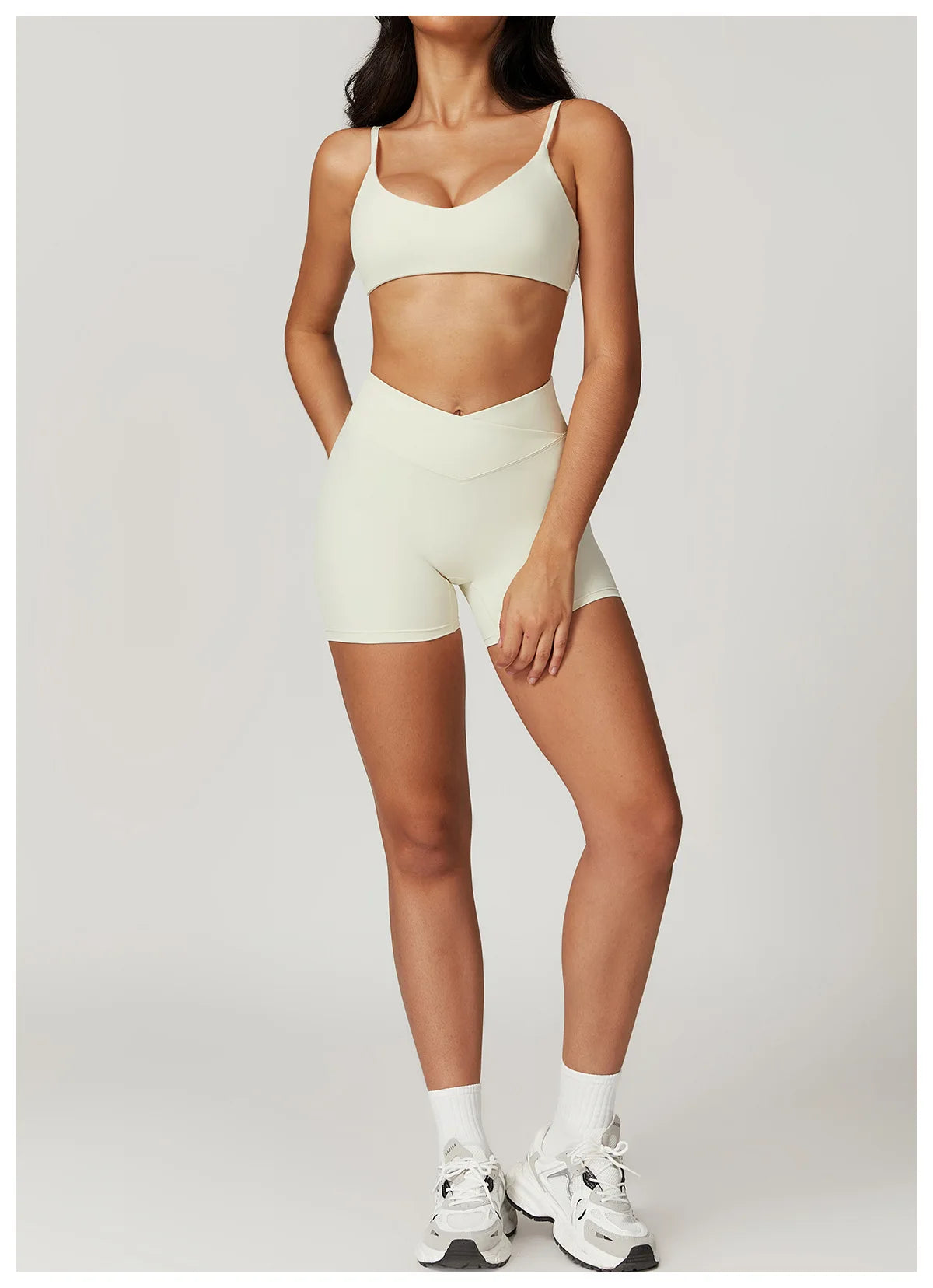 Two-piece women's fitness set with crop top, sports bra, and leggings by The Clothing Company Sydney, designed for yoga and gym workouts.