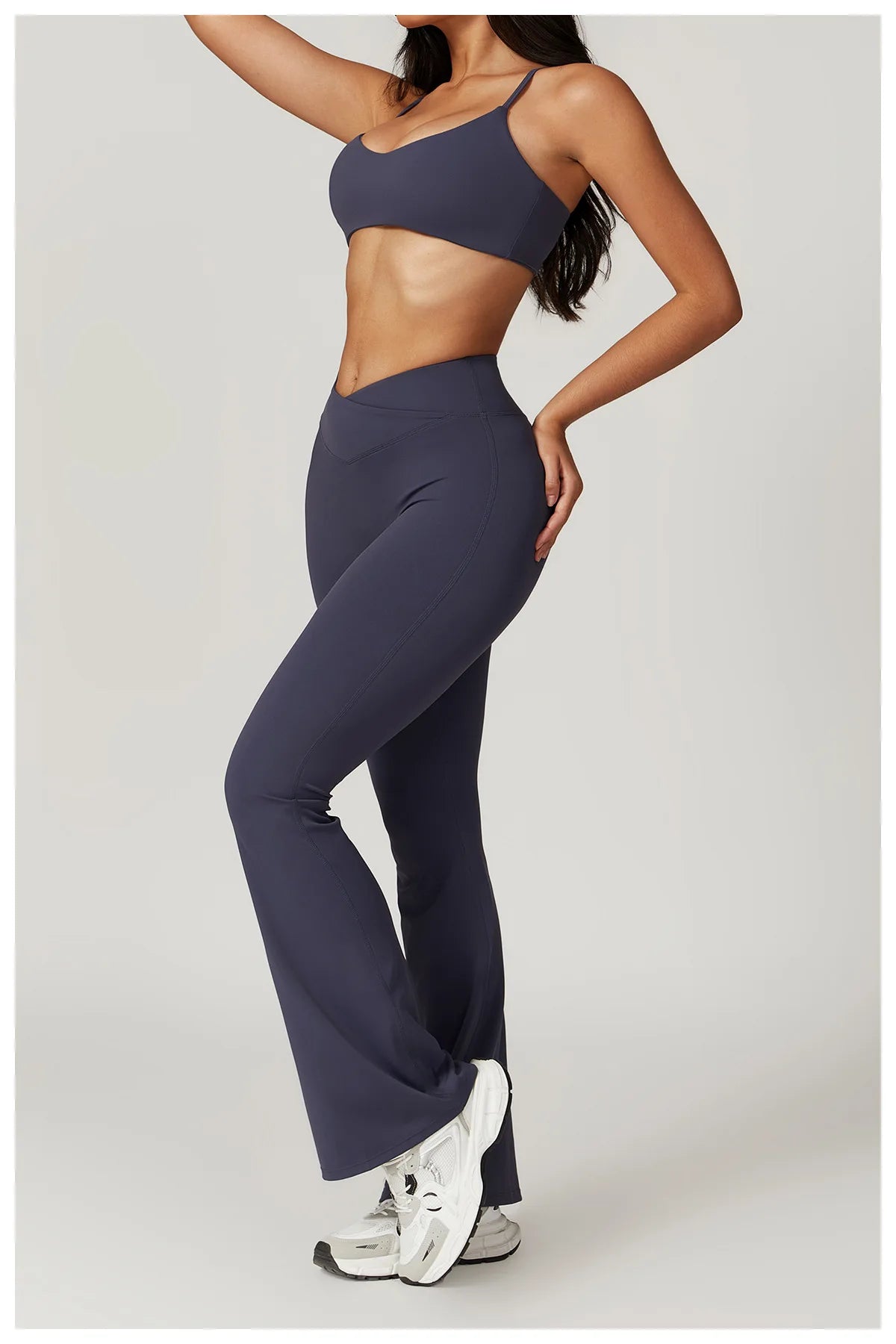Two-piece women's fitness set with crop top, sports bra, and leggings, perfect for yoga and gym workouts by The Clothing Company Sydney.