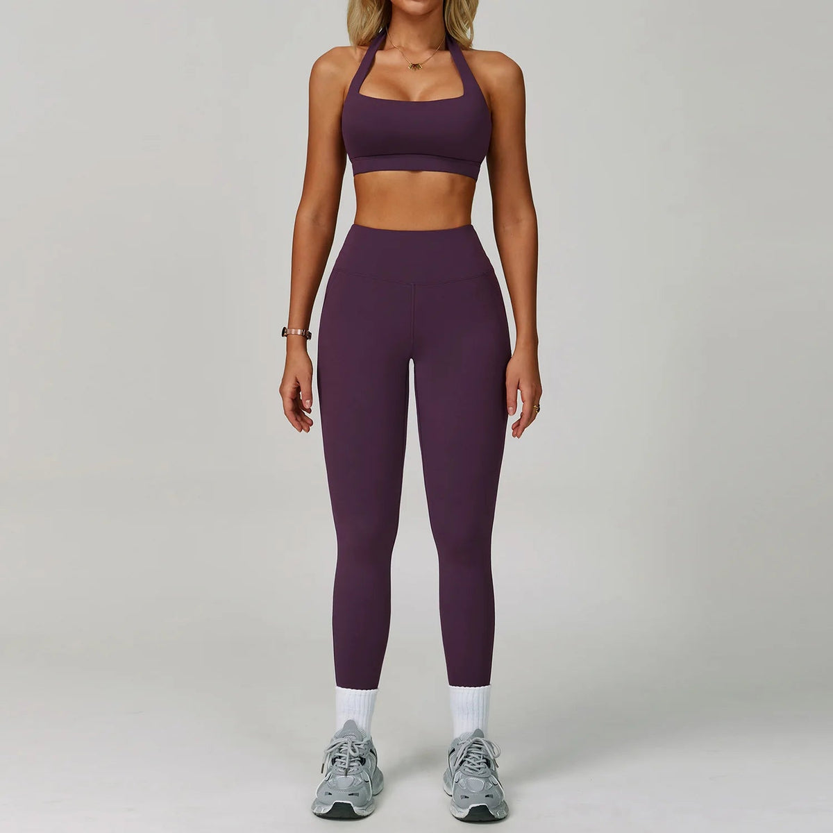 The Clothing Company Sydney women's 2-piece fitness tracksuit with high-waist leggings and workout bra, ideal for yoga and gym workouts.