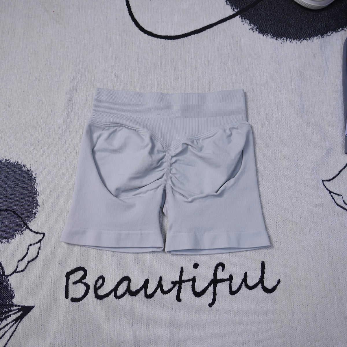 Women's high-waisted seamless yoga shorts by The Clothing Company Sydney, breathable gym and running workout shorts with butt-lifting fit.