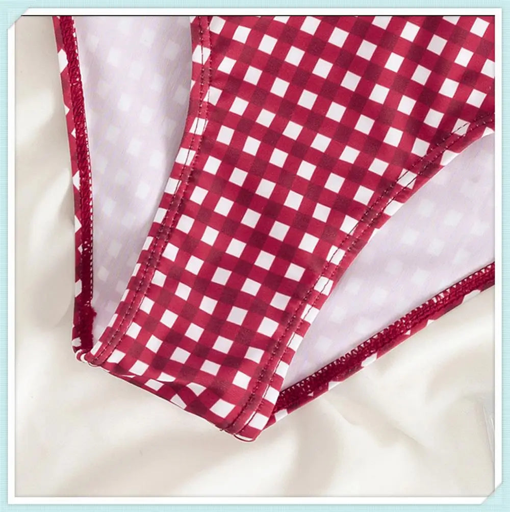 High waist printed swimsuit by The Clothing Company Sydney featuring padded cups and strappy design, ideal for beachwear.
