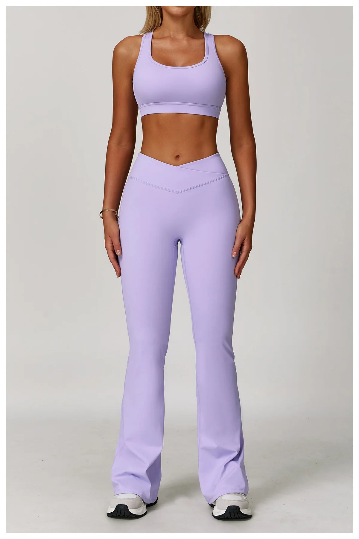 Two-piece women's fitness yoga gym outfit by The Clothing Company Sydney, includes sports bra and matching workout leggings.