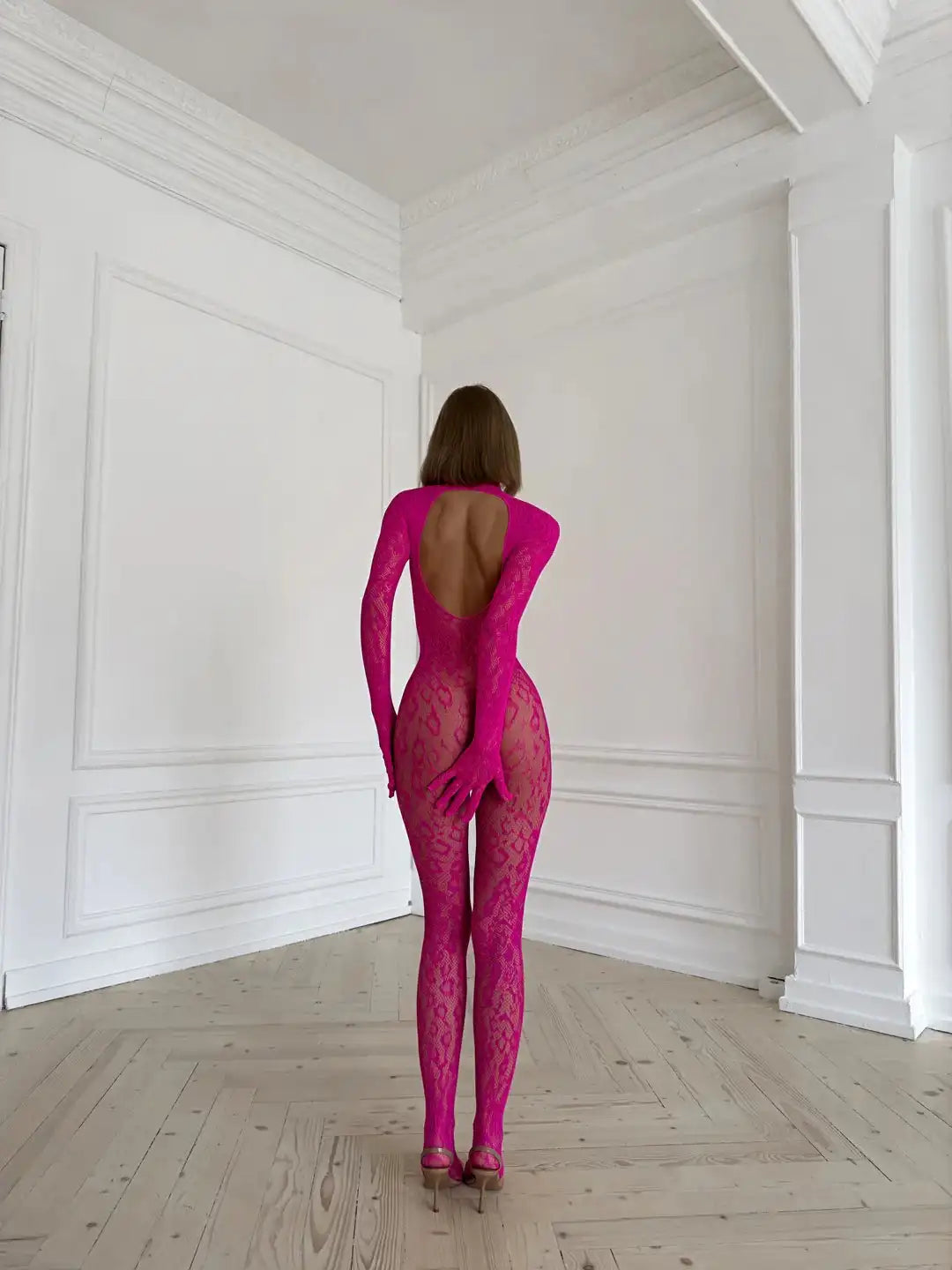 Backless sheer long sleeve jumpsuit by The Clothing Company Sydney, adult doll-themed cosplay outfit with lingerie details.
