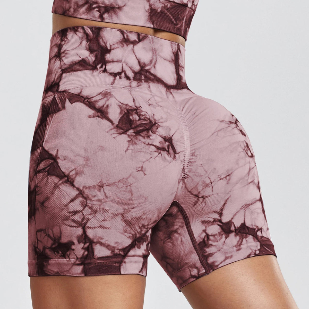 Colorful tie dye gym shorts for women by The Clothing Company Sydney, high waist, seamless, perfect for summer outdoor fitness and bike rides.
