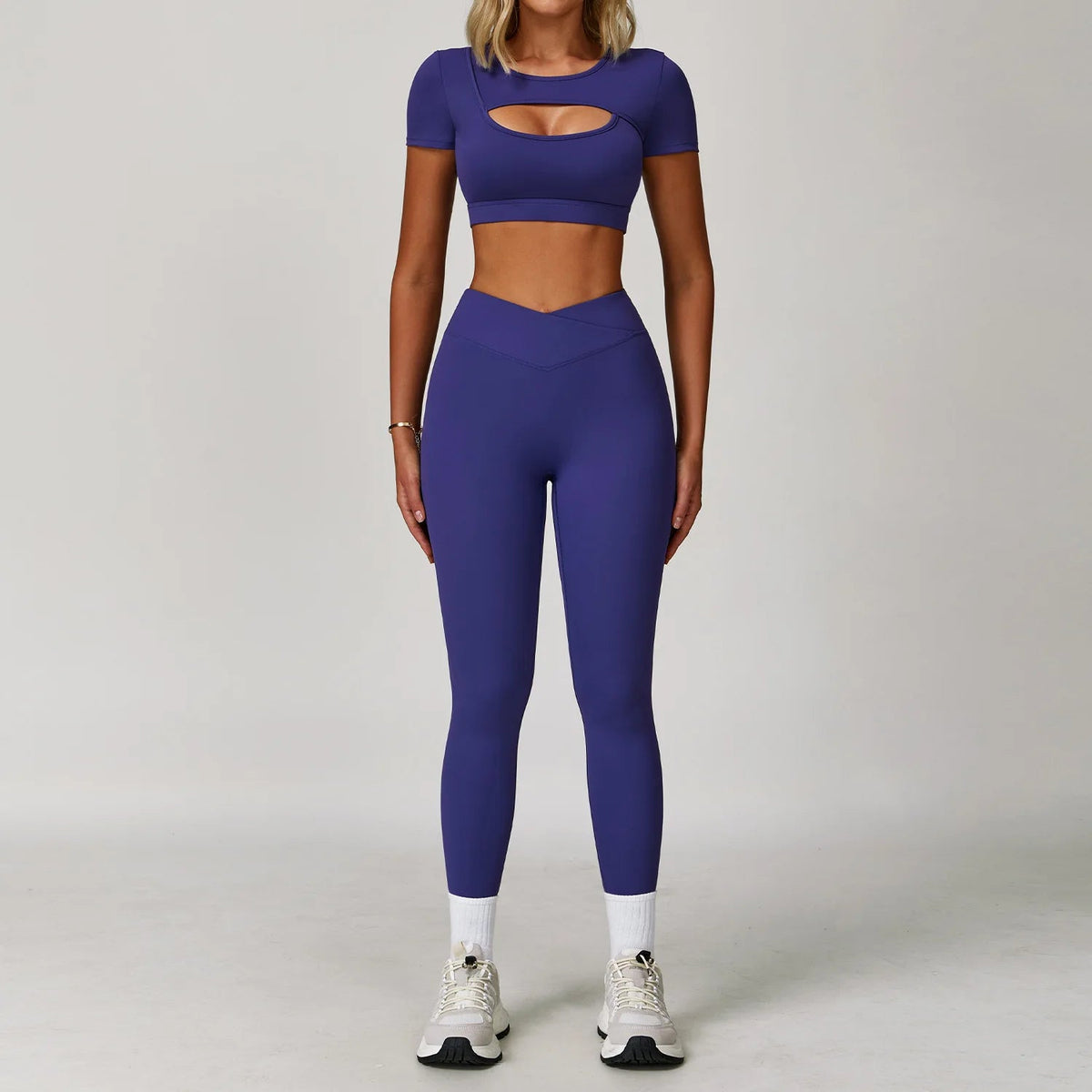 Two-piece women's fitness yoga gym outfit including sports bra and leggings from The Clothing Company Sydney, suitable for workout and running.