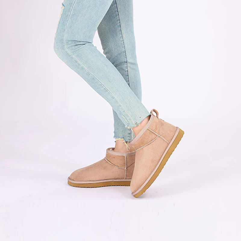 Women’s classic snow boots by The Clothing Company Sydney, warm short ankle footwear with durable waterproof design.