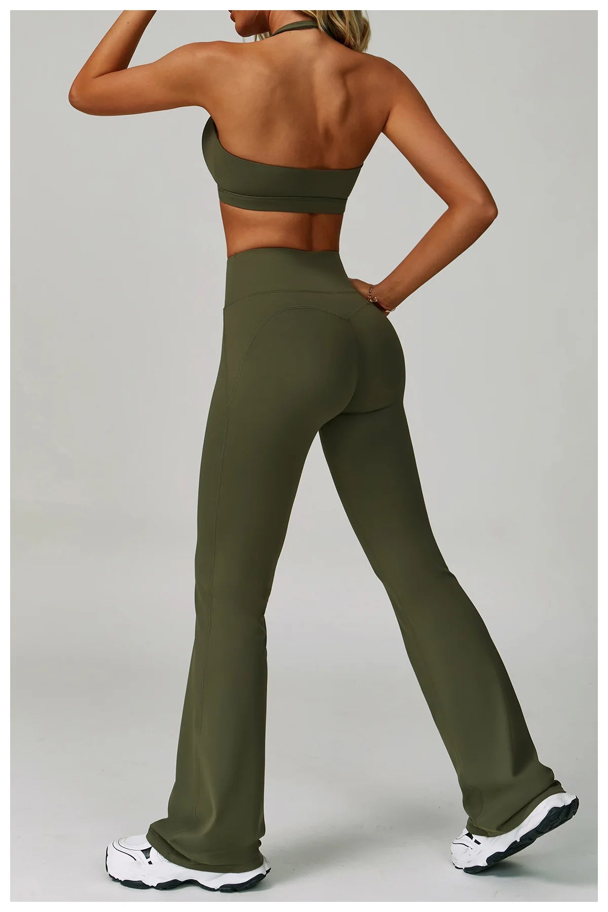 Two-piece women's fitness tracksuit with high-waist leggings and sports bra from The Clothing Company Sydney, ideal for yoga and workouts.