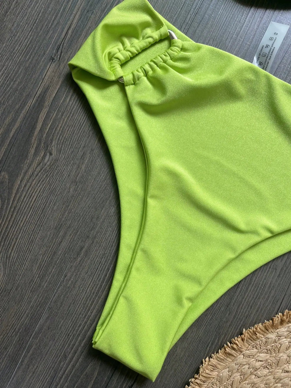 Two-piece bandeau bikini from The Clothing Company Sydney featuring push-up top and thong bottoms in solid color, ideal for beachwear.