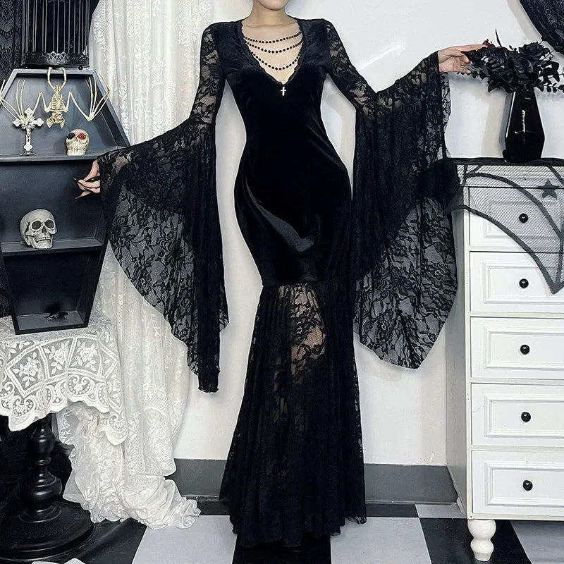 Women's black Gothic Halloween dress with batwing sleeves by The Clothing Company Sydney, featuring a stylish and spooky design.