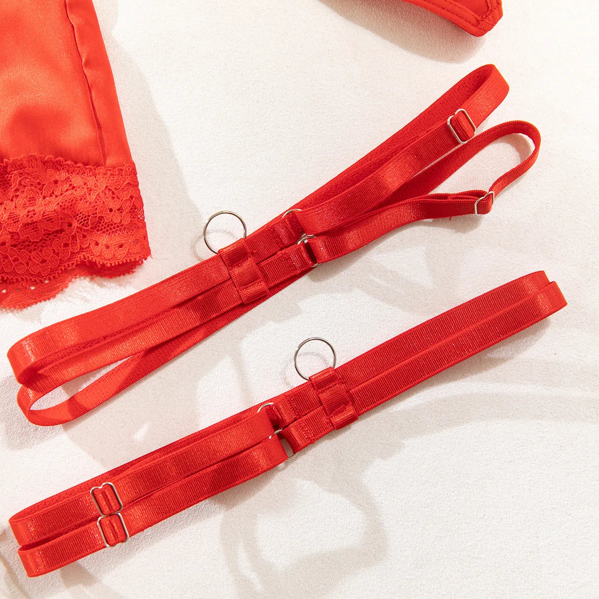 Lace lingerie set with halter bra, heart g-string, and garter, featuring intricate lace details and revealing exotic underwear.