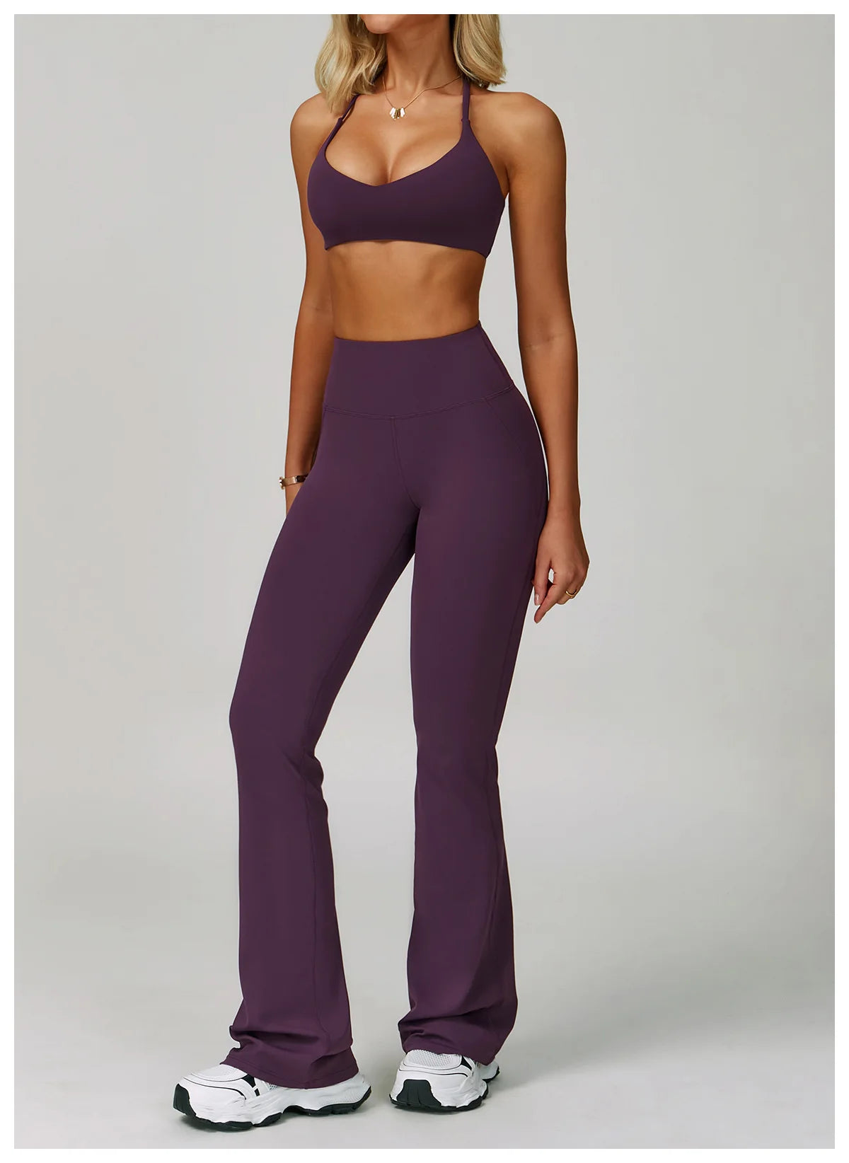 Women's fitness tracksuit set by The Clothing Company Sydney, high waist leggings and sports bra for yoga and workout sessions.