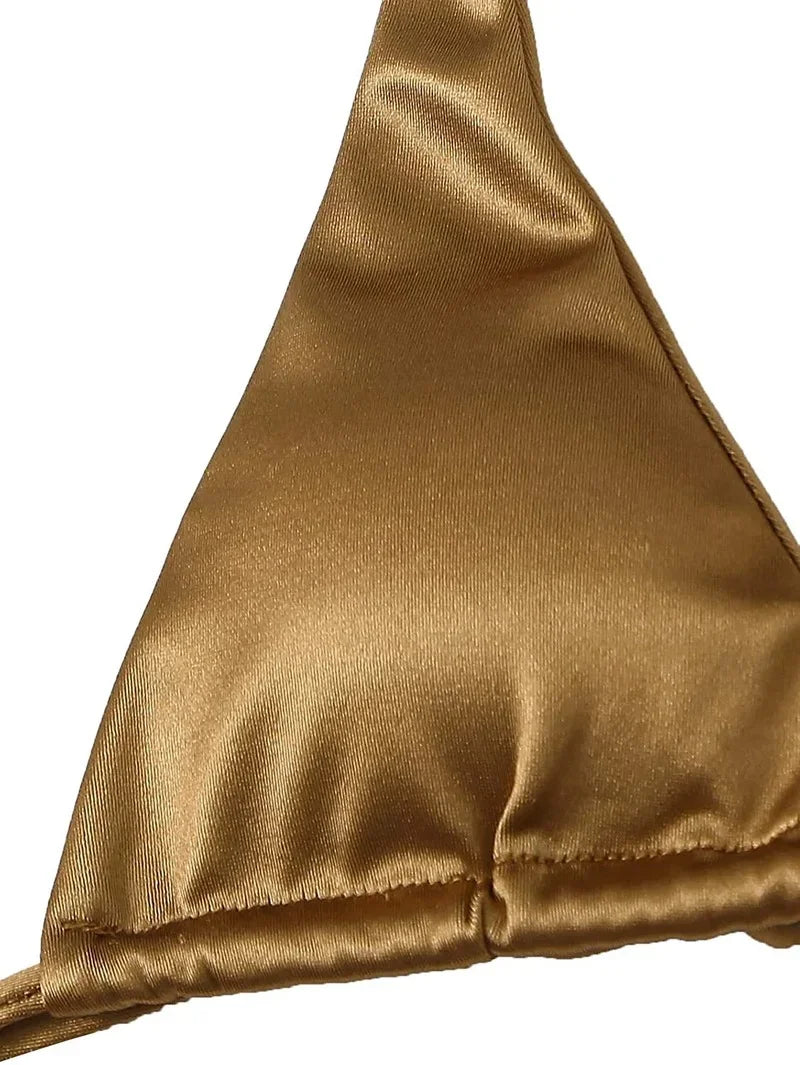 Two-piece halter Brazilian metallic satin swimsuit by The Clothing Company Sydney, featuring high-cut bikini bottoms and a matching top.