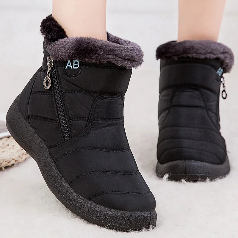 Women’s winter snow boots with warm fur lining and ankle height, designed by The Clothing Company Sydney for cold weather comfort.