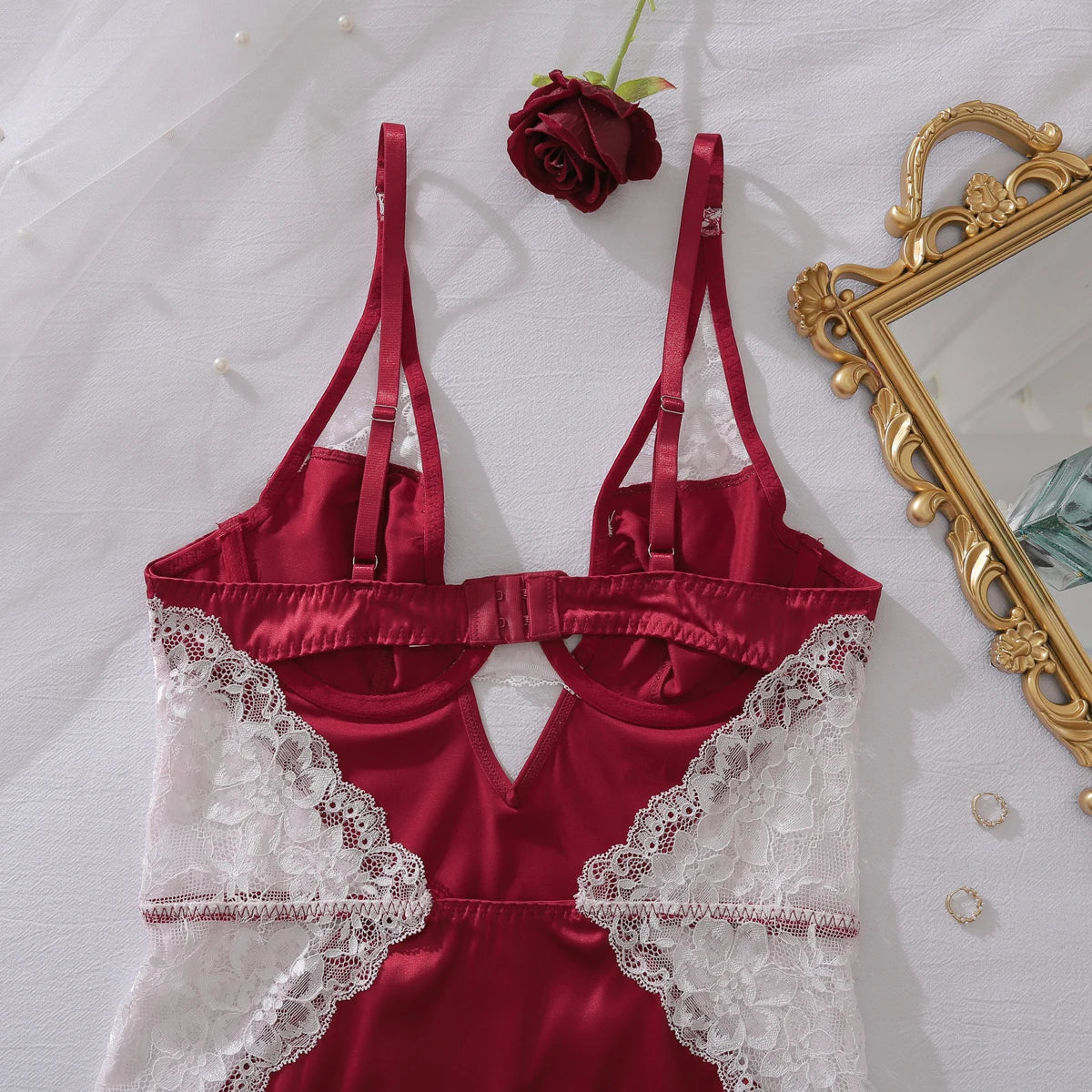 Deep-V neck satin lingerie slip dress with lace patchwork and split design, stylish nightwear for women.