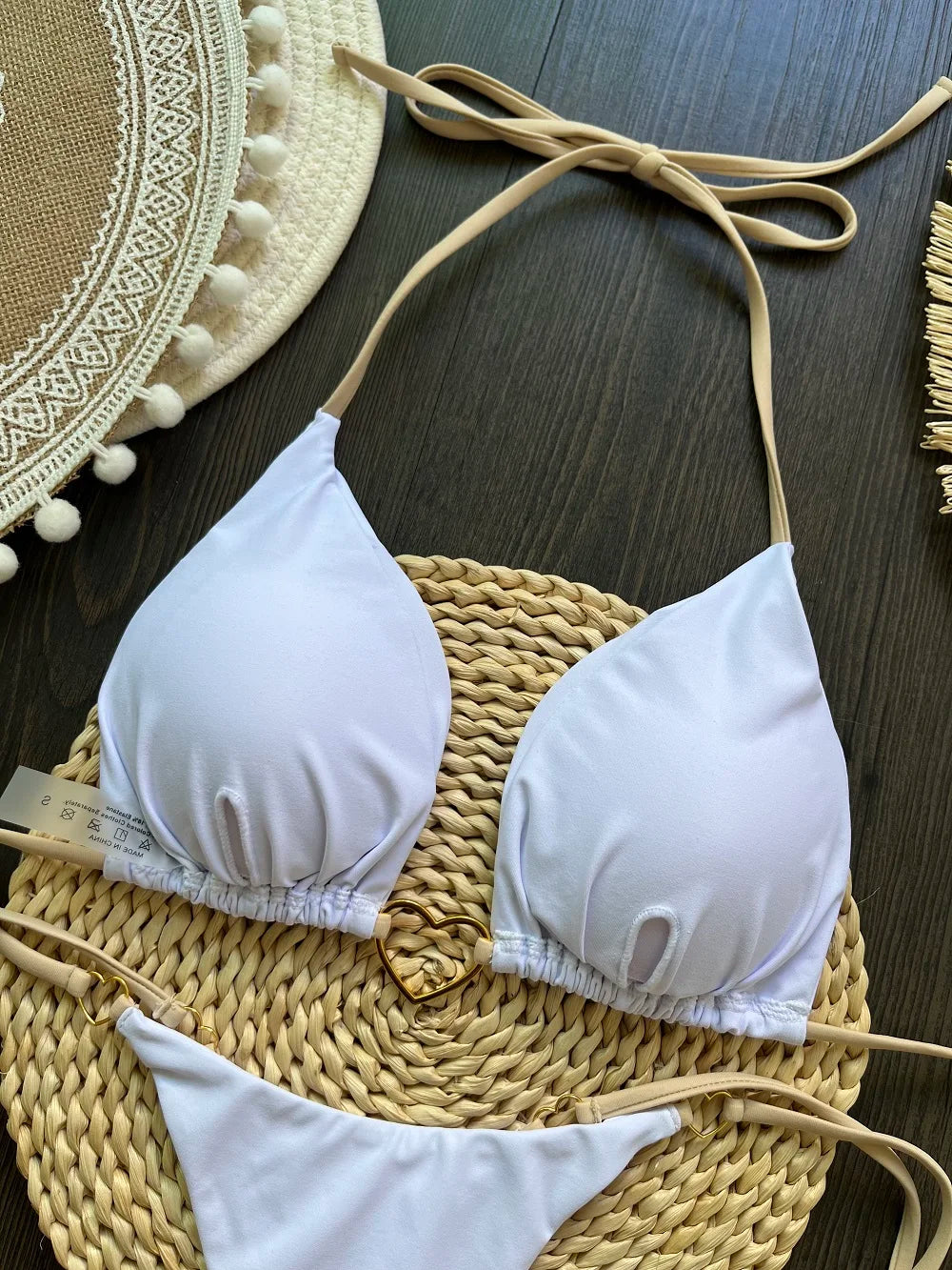 Solid color halter bikini set for women, two-piece swimsuit with triangle top and thong bottom, by The Clothing Company Sydney.