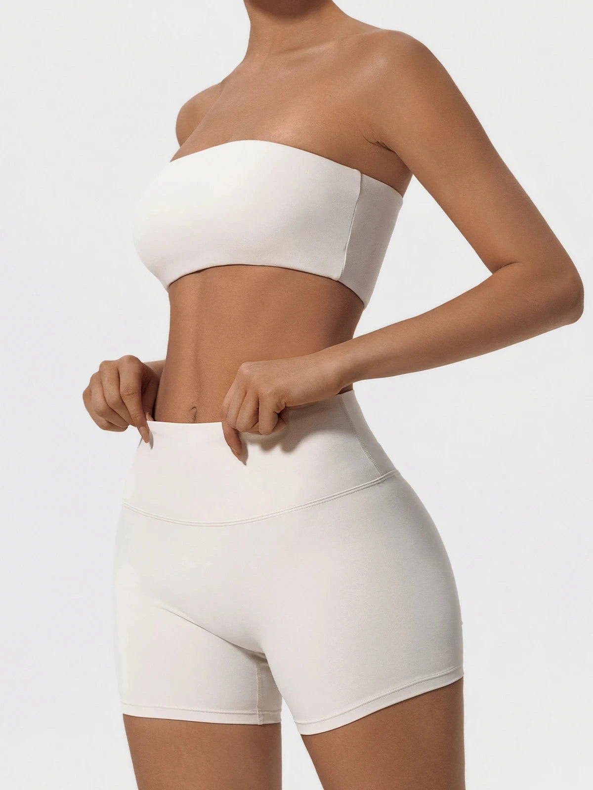 Two-piece women's fitness sports set with strapless bra and gym crop top, ideal for workout and yoga by The Clothing Company Sydney