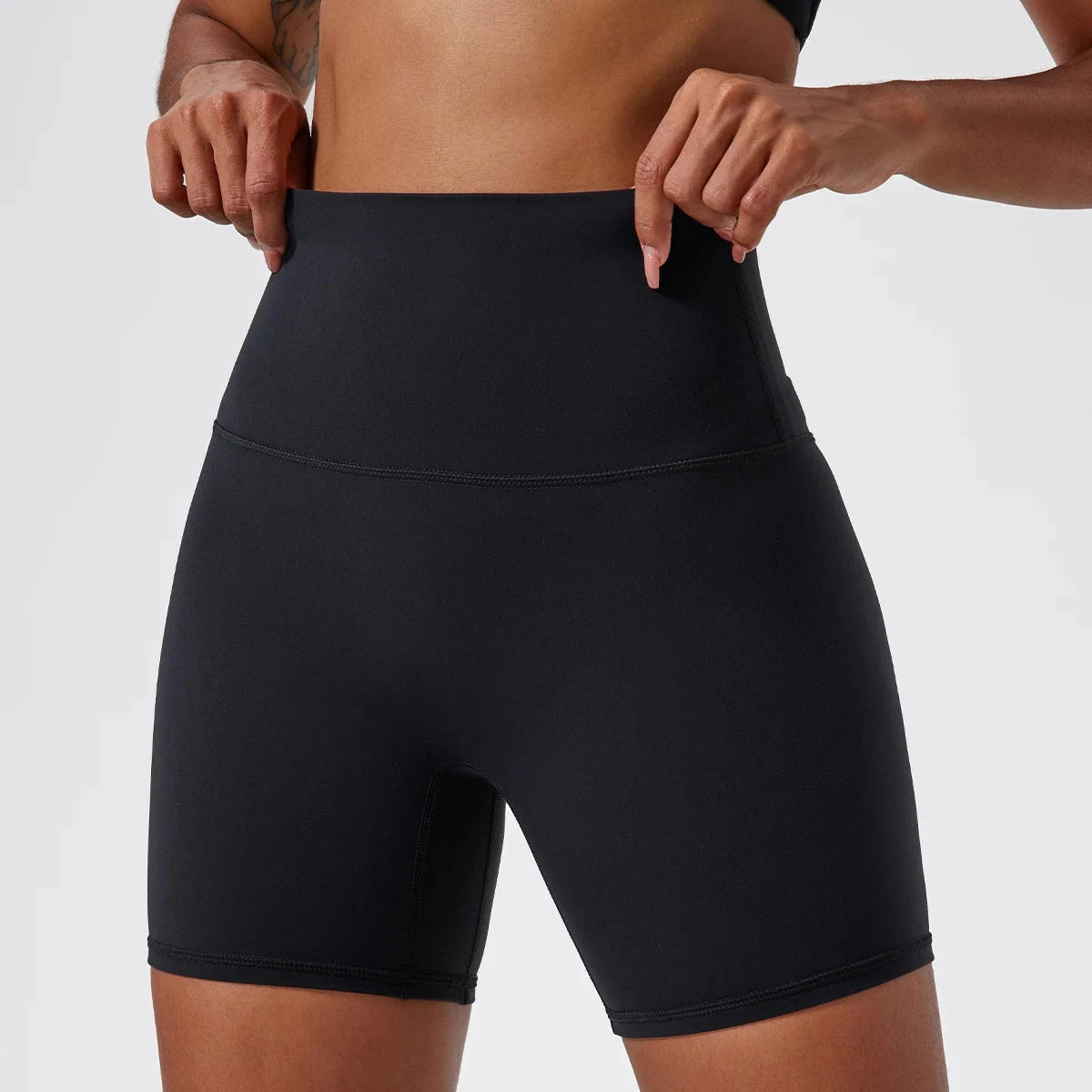 High-waist yoga shorts for women by The Clothing Company Sydney, featuring a snug fit and athletic design for workouts and running.