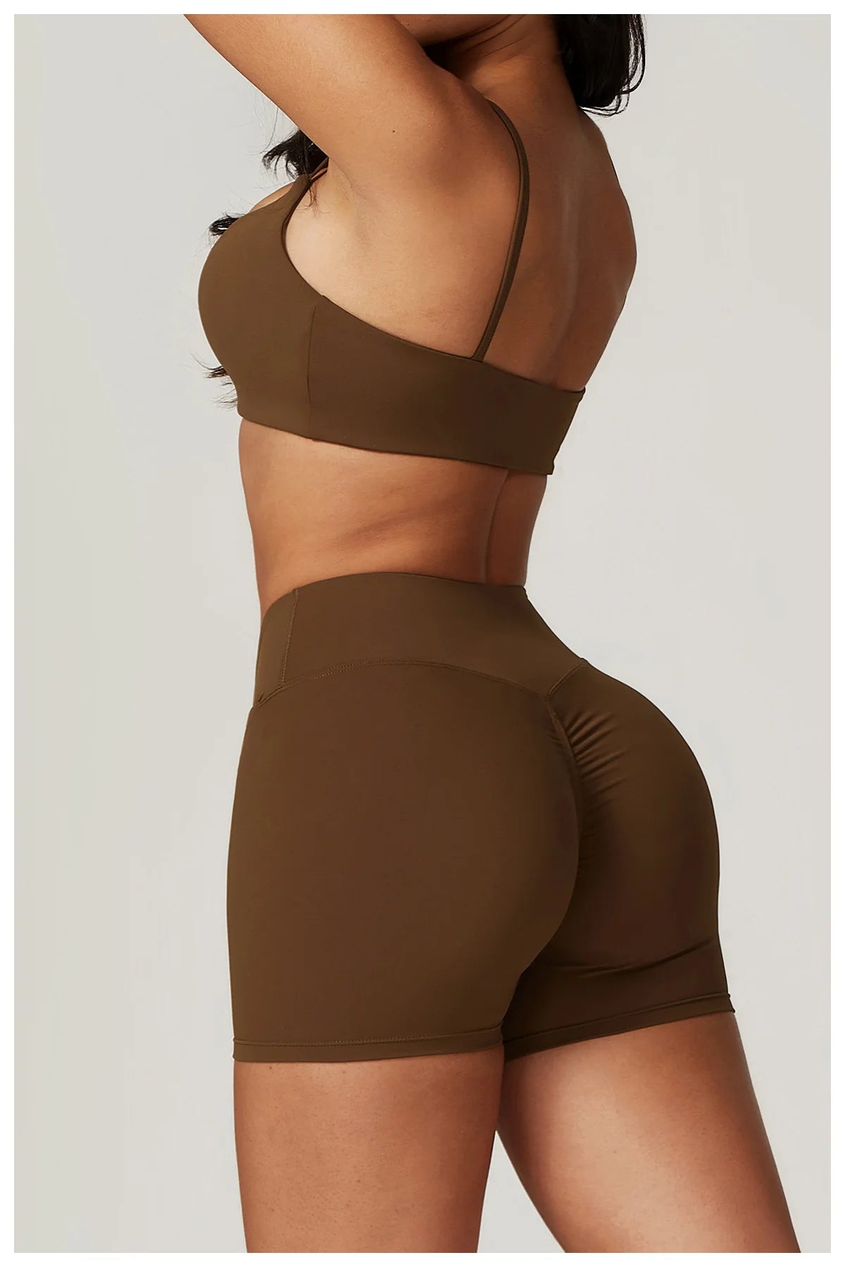 Two-piece women's fitness set by The Clothing Company Sydney, includes crop top, sports bra, and gym leggings with bike shorts.