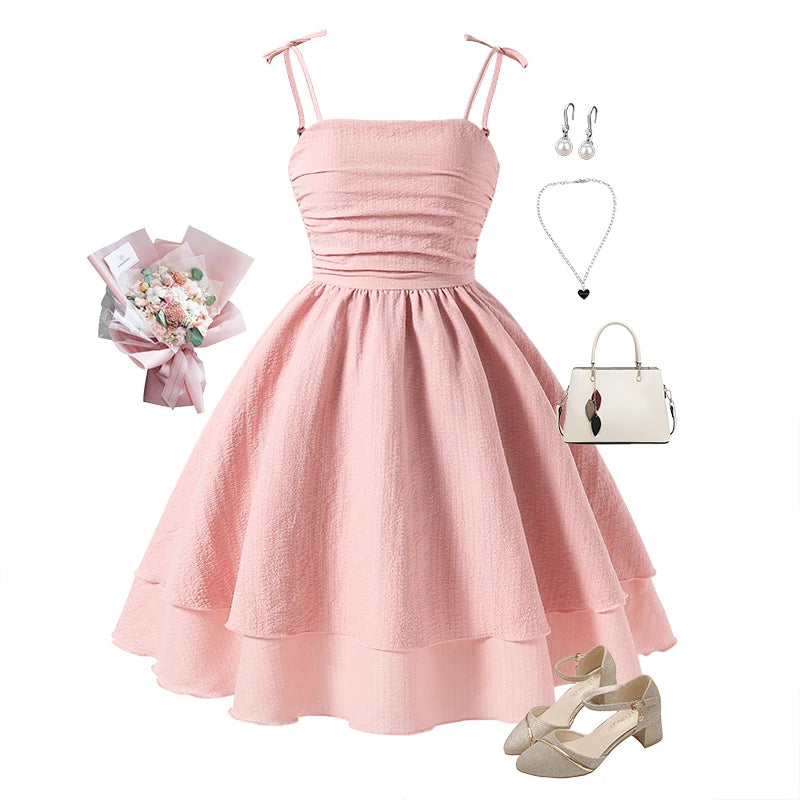Pink tiered sling princess dress for kids by The Clothing Company Sydney, featuring a sweet style perfect for tween girls' birthday parties.