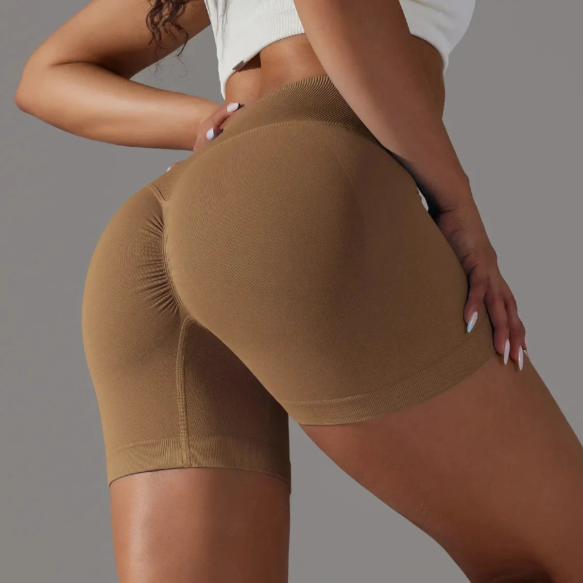 Women’s high waist fitness yoga leggings by The Clothing Company Sydney, seamless gym shorts with scrunch butt and push-up design.