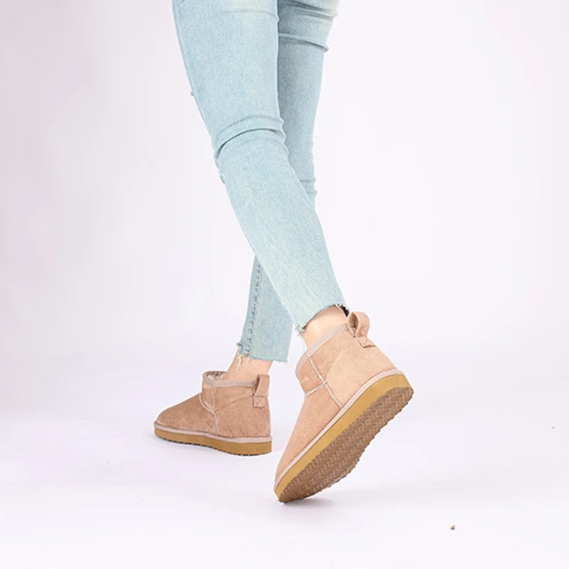Women’s classic snow boots by The Clothing Company Sydney, warm ankle-length footwear with a short, stylish design for winter wear.