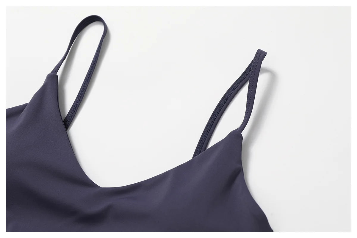Two-piece women's fitness set by The Clothing Company Sydney, includes short sleeve crop top, sports bra, and gym leggings with bike shorts