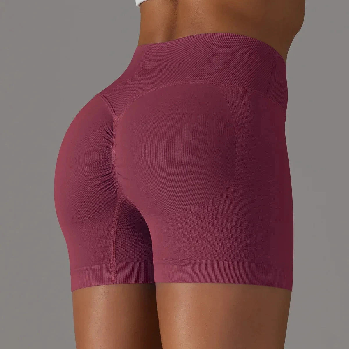 Women’s high waist fitness yoga leggings from The Clothing Company Sydney, seamless sports bike shorts with scrunch butt design.