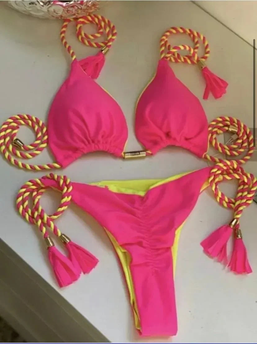 Backless women's bikini swimwear with rope triangle design, from The Clothing Company Sydney, showcasing the swimsuit's style and fit.