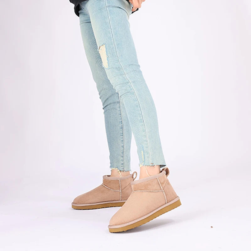Women's classic snow boots by The Clothing Company Sydney, warm ankle-length winter footwear with a short, stylish design.