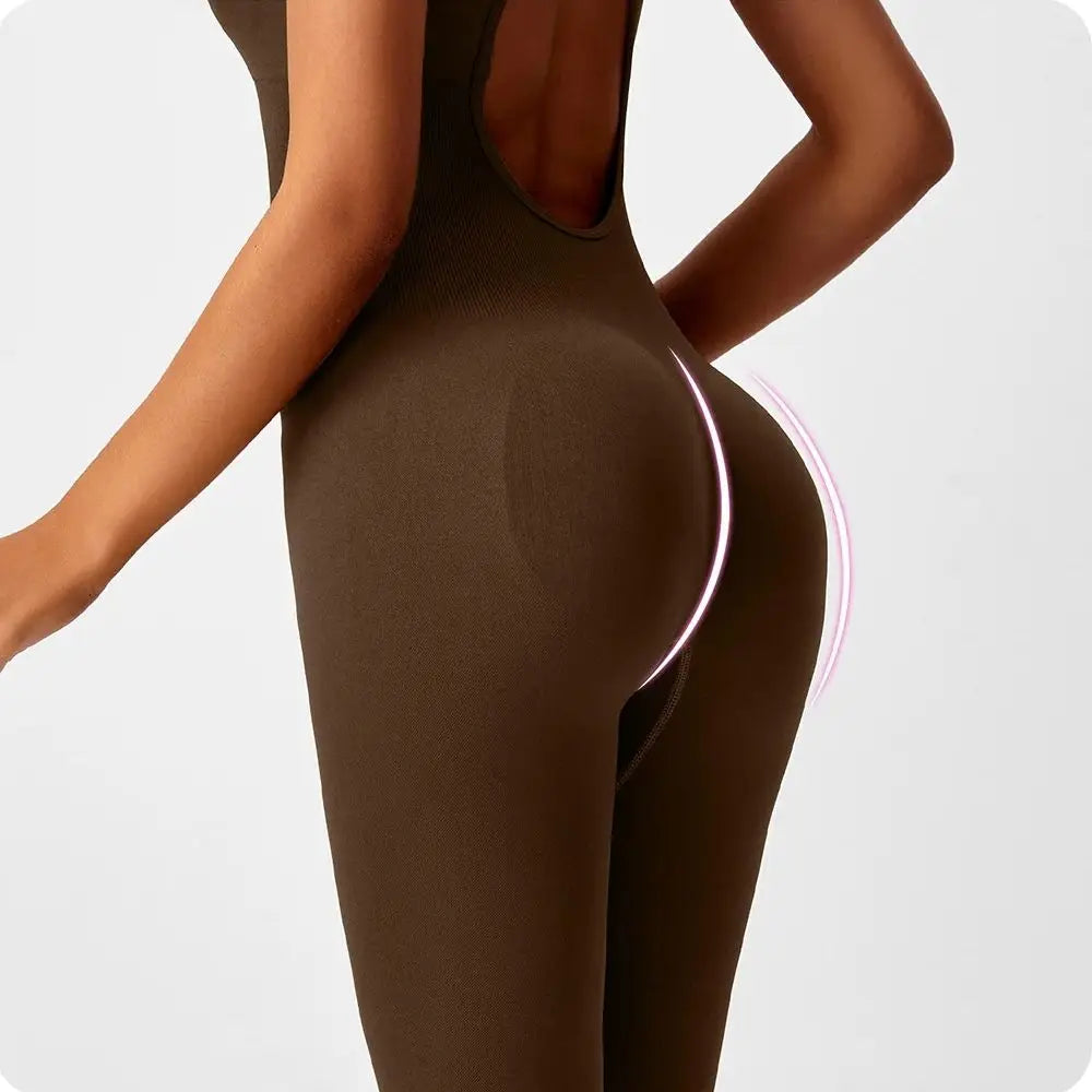 Seamless peach-colored women's yoga bodysuit with V-back design, fitness activewear by The Clothing Company Sydney for workout and gym.