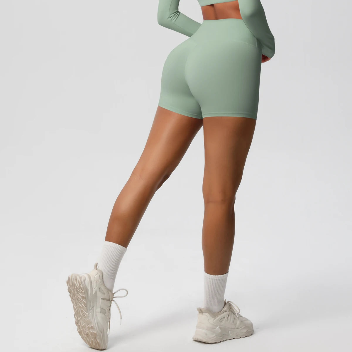 Women’s high-waist yoga shorts by The Clothing Company Sydney, featuring a push-up fit and sporty design for fitness and active wear.