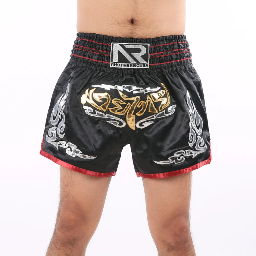 Unisex Muay Thai shorts from The Clothing Company Sydney, lightweight kickboxing and MMA training gear, shown in black with branding.