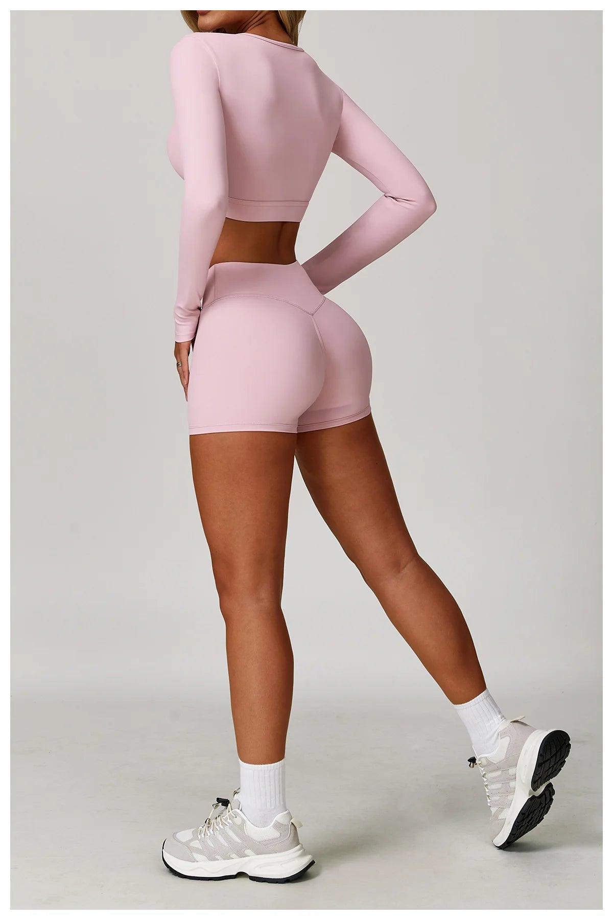 Two-piece women's fitness set with sports bra and high-waist leggings from The Clothing Company Sydney, suitable for yoga and gym workouts.
