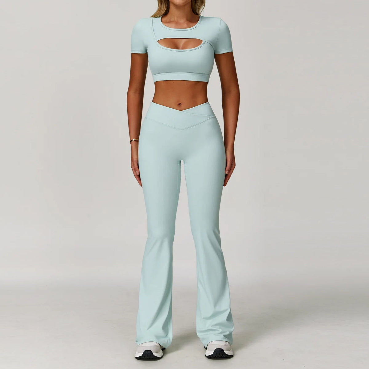 Women's fitness yoga gym clothes set by The Clothing Company Sydney including sports bra and matching leggings for workout and running.
