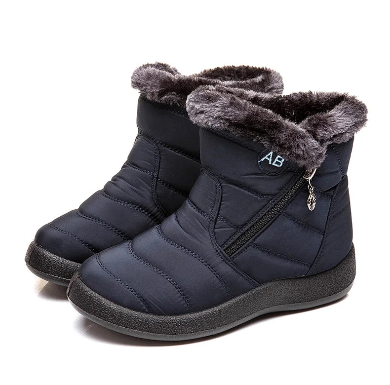 Women's winter ankle boots with low heels from The Clothing Company Sydney, featuring a stylish snow-ready winter footwear design.