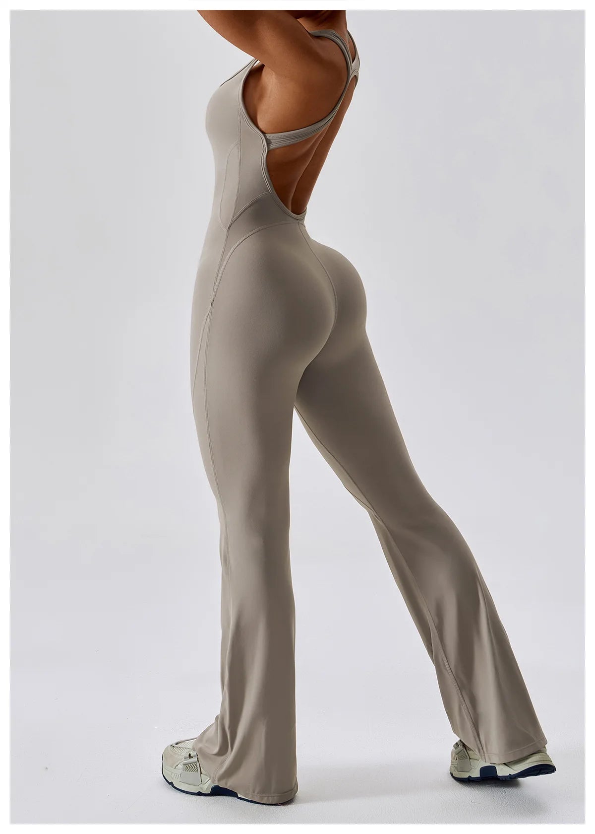 Open back V jumpsuit gym set for women, featuring stretch fabric, ideal for yoga, training, and fitness workouts.