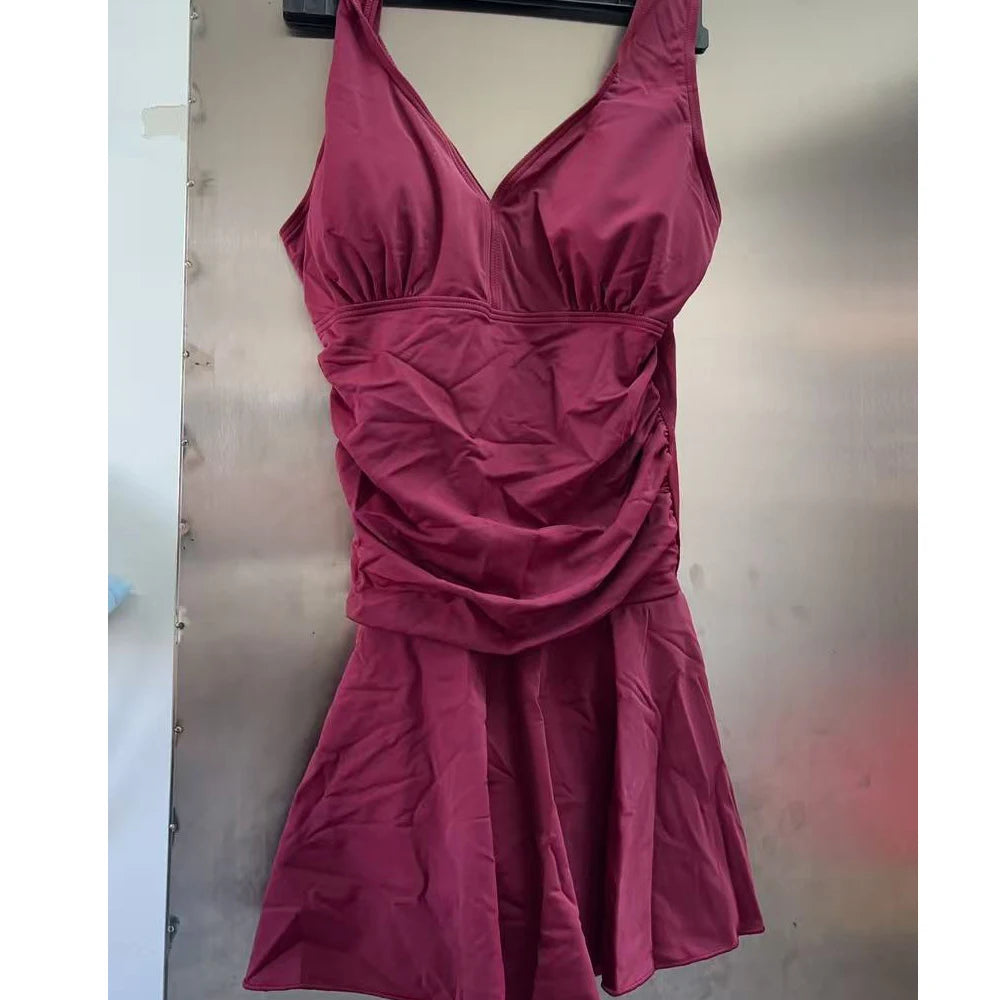 Women’s floral print modest swim dress by The Clothing Company Sydney, plus-size padded one-piece swimsuit for swimming and beachwear.