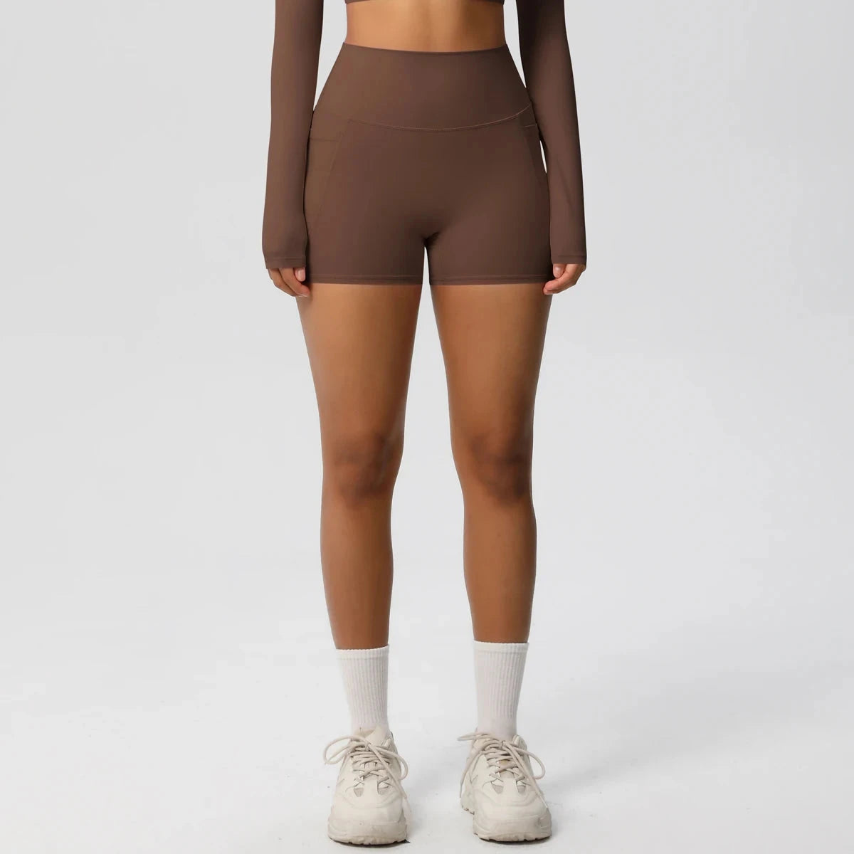 High-waisted bicycle yoga shorts by The Clothing Company Sydney, quick-drying, breathable workout pants with pockets for women.