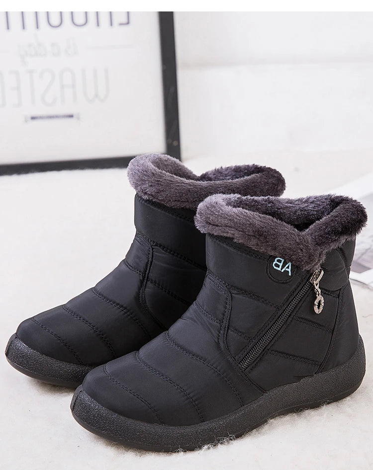 Women's winter snow boots with warm fur lining and ankle height, designed for cold weather comfort and style.