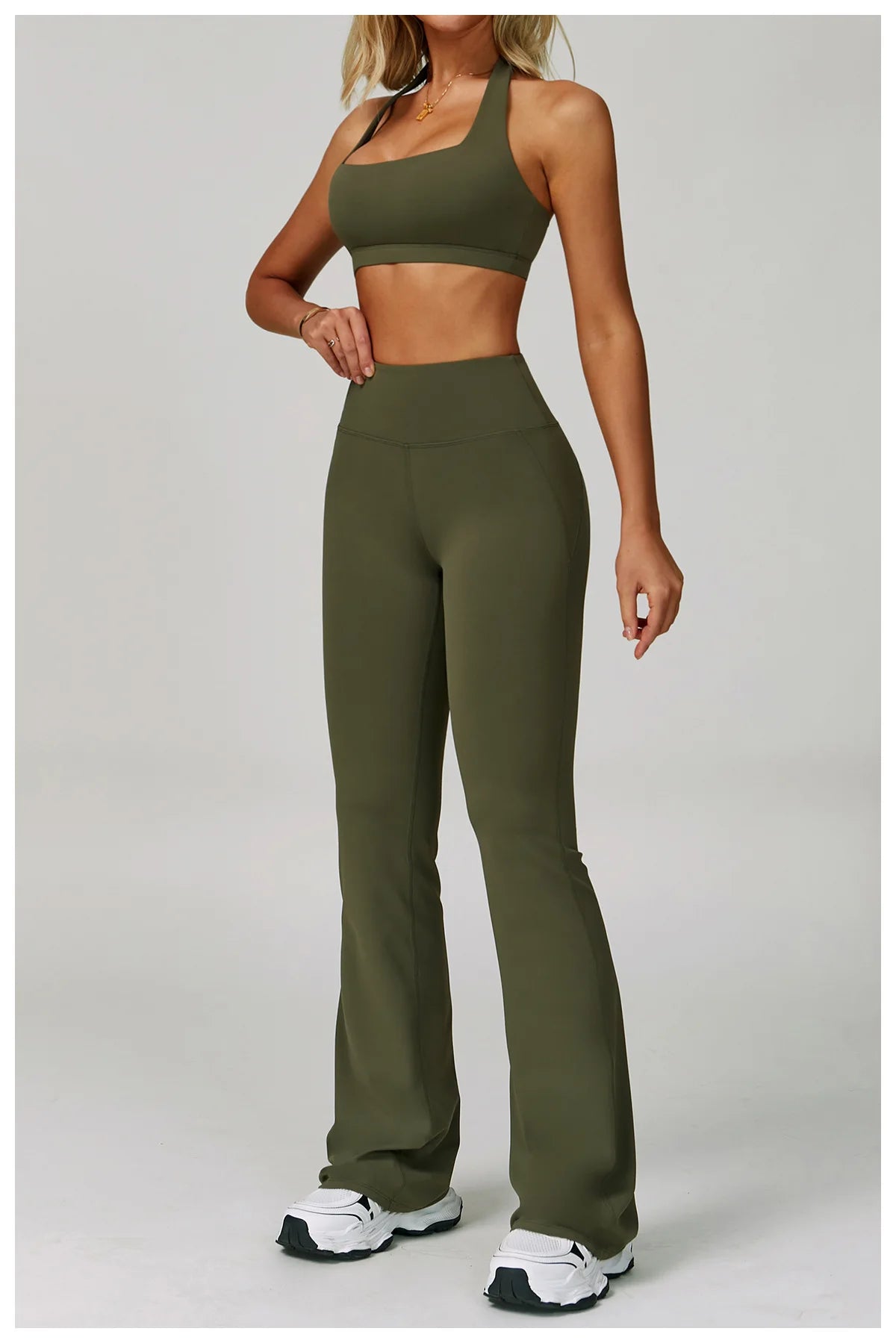 The Clothing Company Sydney women's 2-piece fitness tracksuit with high-waist leggings and sports bra for yoga and workout sessions.