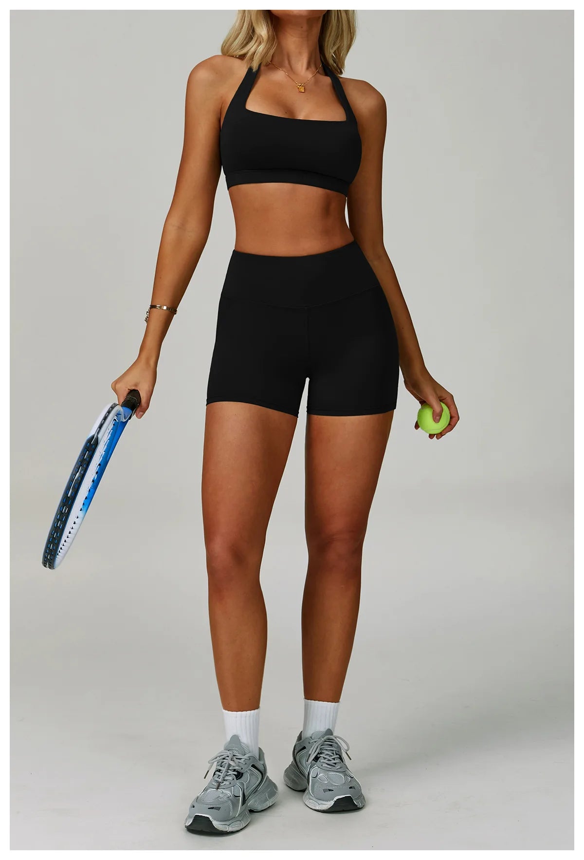 Women's fitness tracksuit set by The Clothing Company Sydney with high waist leggings and sports bra for yoga and gym workouts.