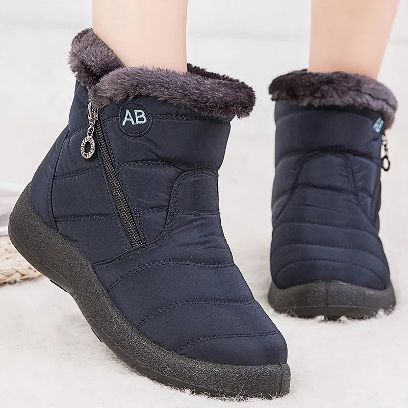Women’s winter snow boots with warm fur lining and ankle height, stylish footwear by The Clothing Company Sydney.