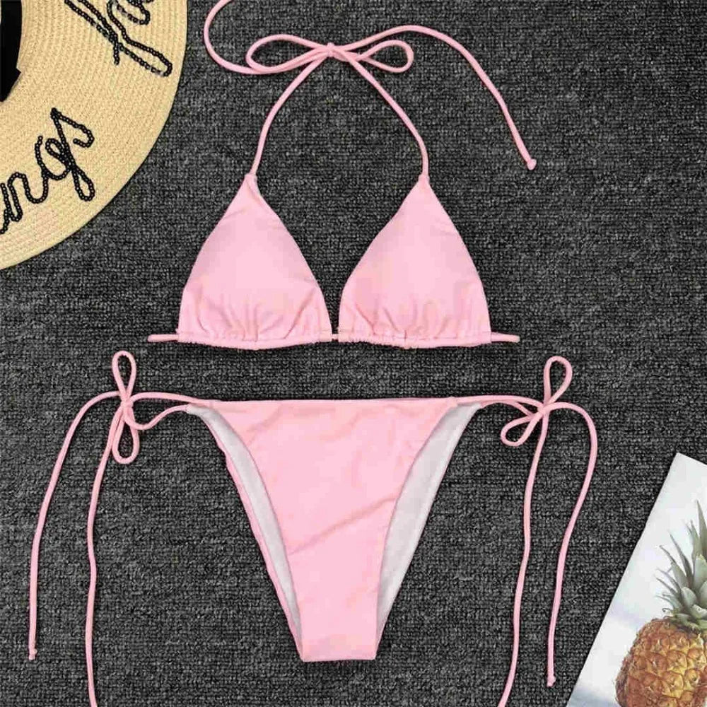 Neon pink Brazilian bikini set for women, halter style swimwear by The Clothing Company Sydney, featuring a two-piece bathing suit.