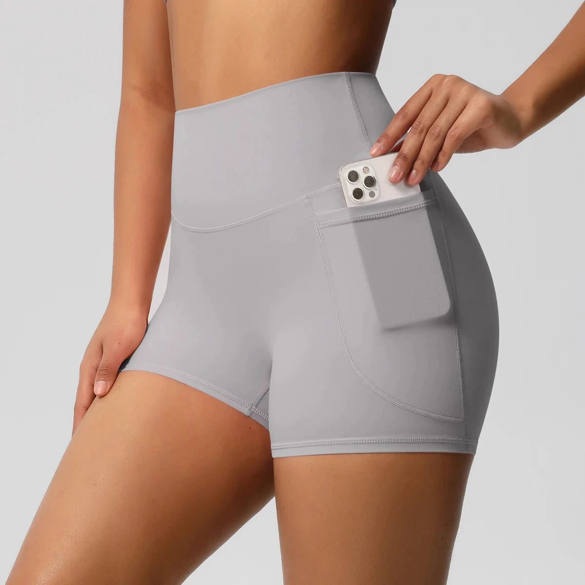 High-waisted bicycle yoga shorts by The Clothing Company Sydney with pockets, quick-drying, breathable fabric, ideal for workout fitness.