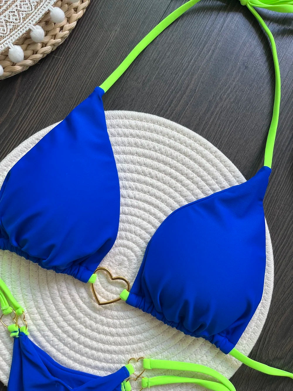 Solid color halter bikini set for women, two-piece swimsuit with triangle top and thong bottoms, by The Clothing Company Sydney.